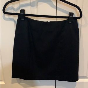 Black mini skirt by MIKAI Size 2